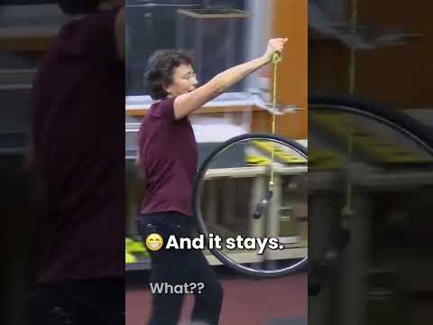 Does the spinning wheel defy gravity? No! It obeys #physics! #funny #fyp #reels #shorts #shortsvideo