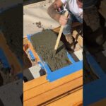 I made some quick and dirty concrete footings for my smart pergola build using the joist as the form